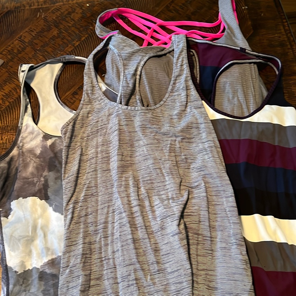 Lot of 4 Lululemon tank tops.
